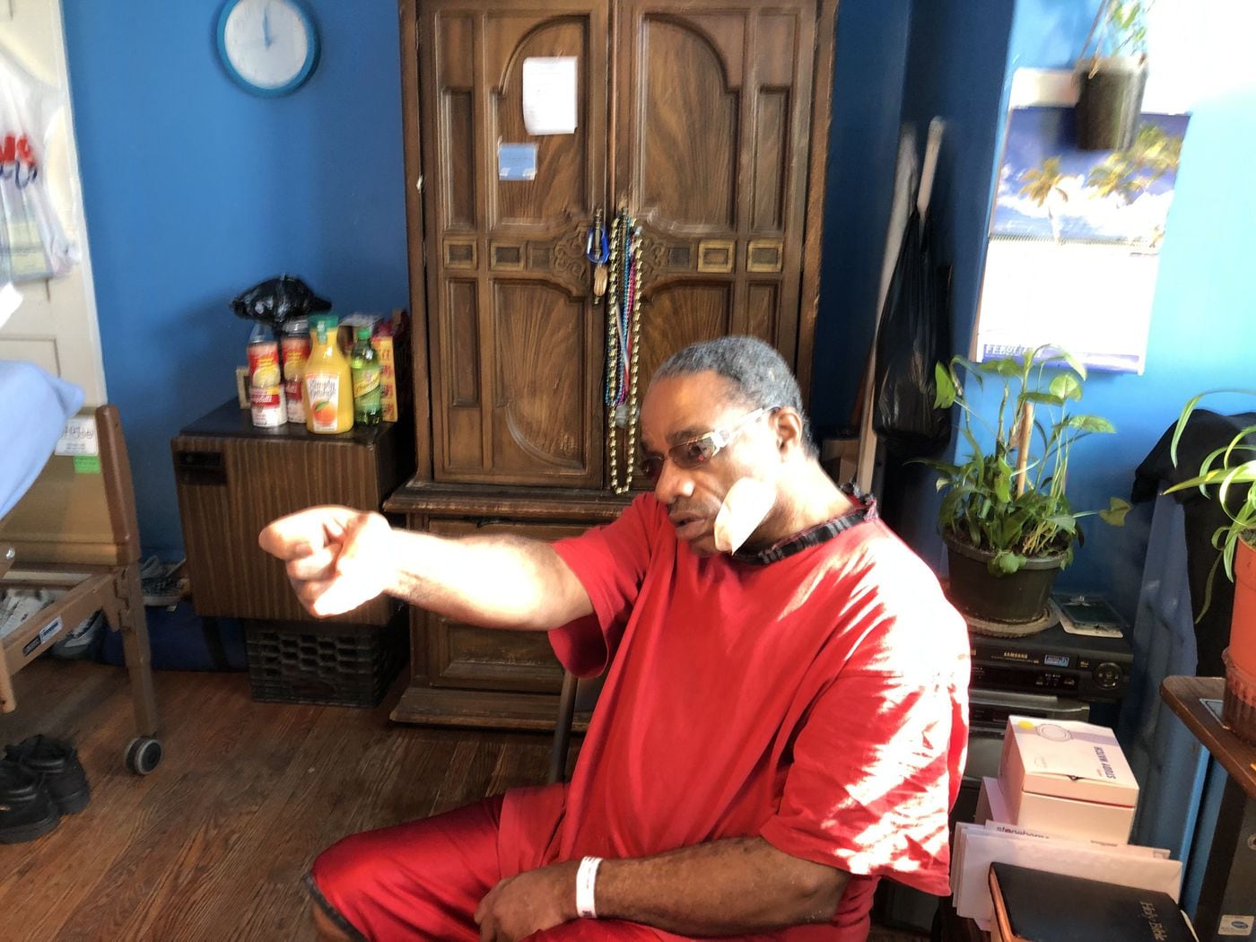 Glenn Hudson, 61, on Jan. 22, 2019 at his North Philadelphia home, demonstrates how a teenage robber shot him at close range on a street corner Jan. 16, 2019. No one has been arrested.