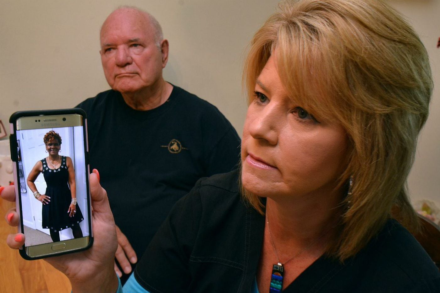 Heidi Austin, with her father, Josef Wituschek, displayed a photo of Gloria Byars from Byars’ Facebook page during a 2017 interview with The Inquirer.